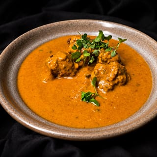 Rasile Aloo-Pakode Curry